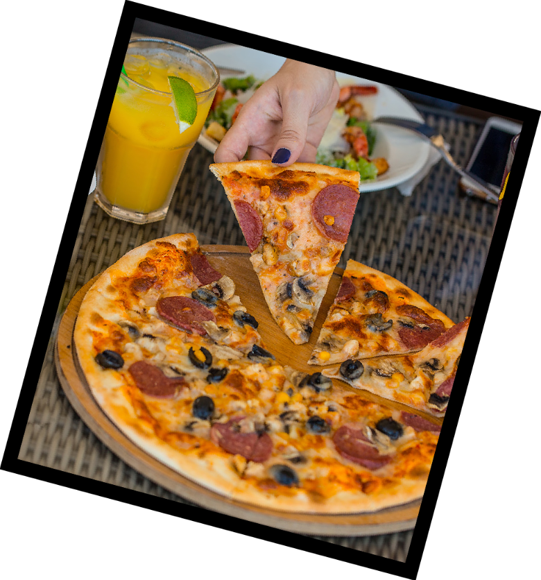 Pizza and drinks being shared around a table